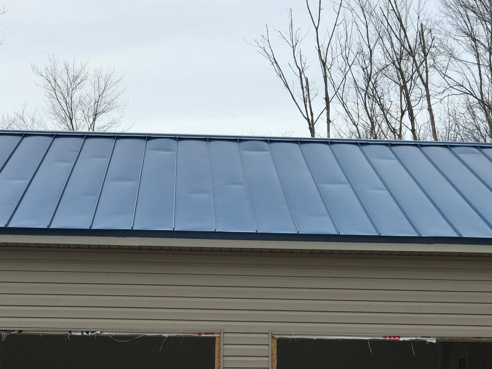 DECRA Metal Roofing vs. Standing Seam Metal Roofs
